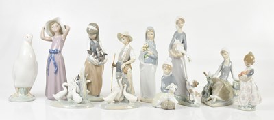 Lot 2447 - LLADRÓ; eight figures including a girl...