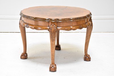 Lot 1130 - A carved walnut low occasional table, with...