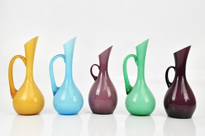Lot 309 - EMPOLI; five Italian art glass ewers, with...