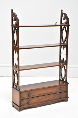 Lot 1118 - A reproduction George III style open shelves,...
