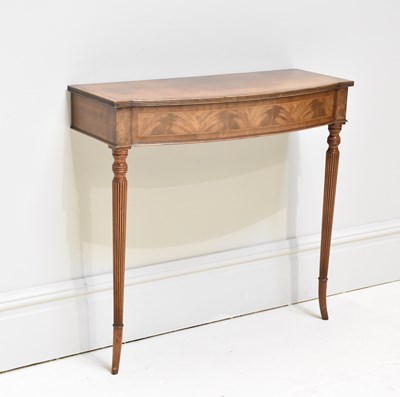 Lot 1137 - A reproduction mahogany hall table, on fluted...