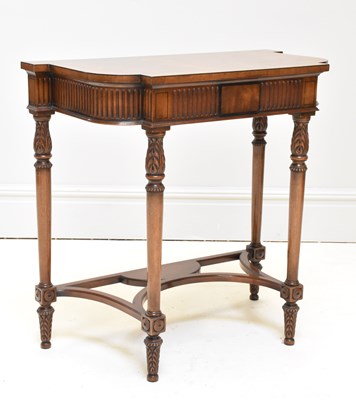 Lot 1119 - A reproduction carved walnut hall table, with...