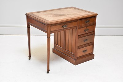 Lot 1218 - A small Edwardian knee-hole desk with four...