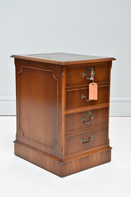 Lot 1121 - A reproduction yew wood filing cabinet, with...