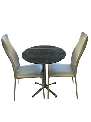 Lot 1031 - A modern circular granite topped table, with...