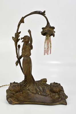 Lot 163 - An Art Nouveau bronzed metal desk lamp...