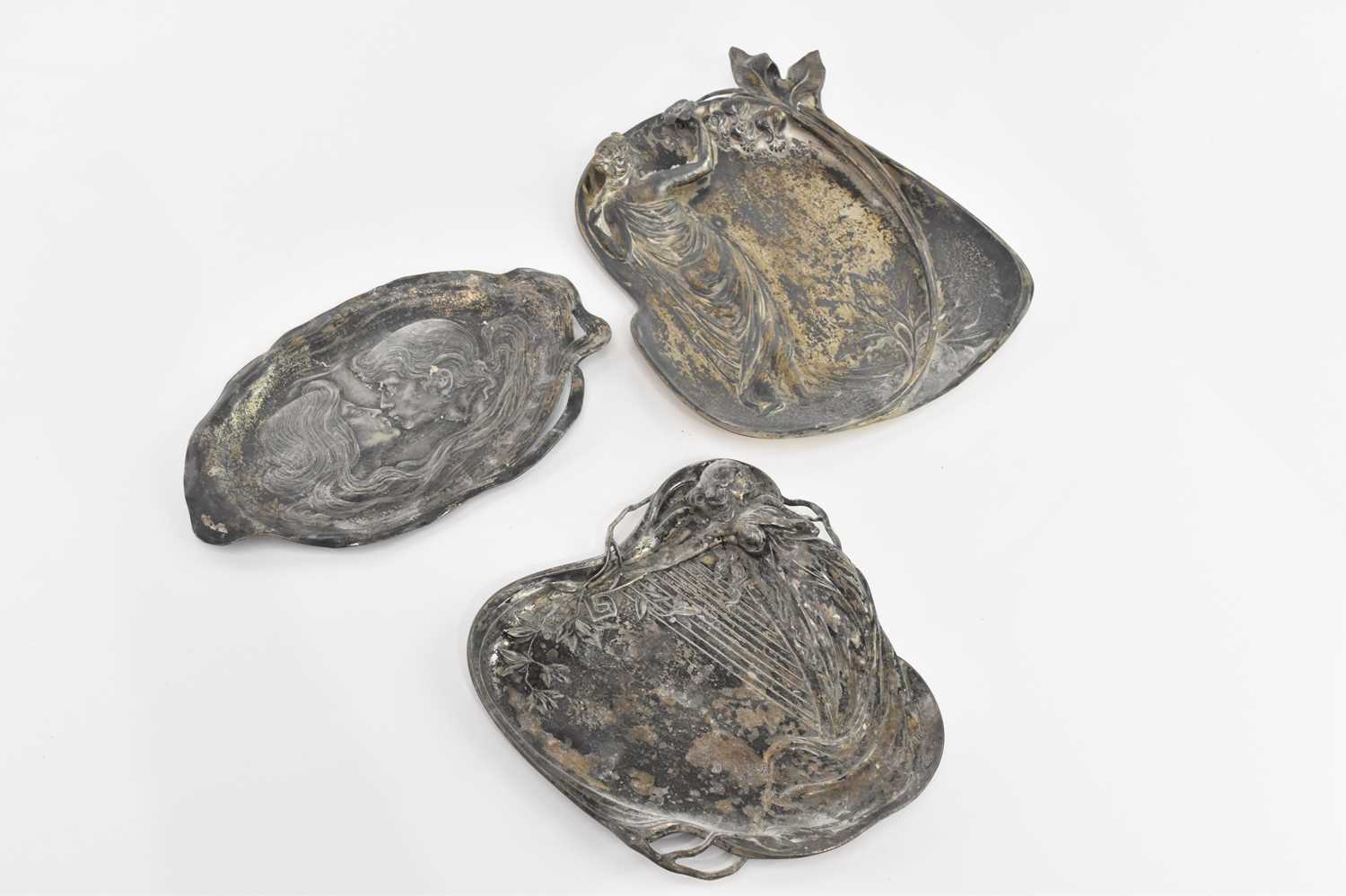 Lot 93 - WMF; three Art Nouveau shaped plaques/plates,...