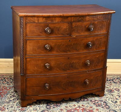 Lot 2854 - A 19th century mahogany bowfront chest of two...