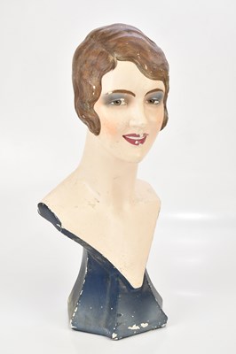Lot 84 - An Art Deco painted plaster bust of a lady...