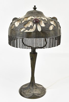 Lot 89 - An Arts and Craft-style bronze table lamp, the...