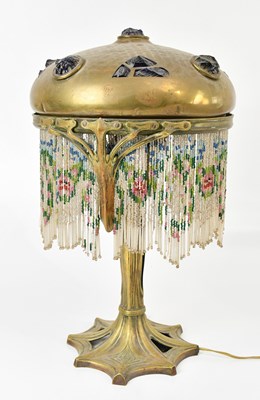 Lot 43 - An Austrian sessesionist bronze and brass...