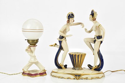 Lot 494 - ROYAL DUX; two Art Deco figural lamps...