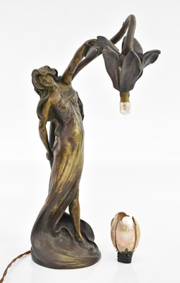 Lot 53 - An Art Nouveau bronze table lamp representing...