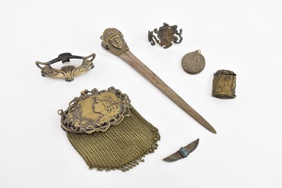Lot 127 - ATTRIBUTED TO WMF; an Art Nouveau brass lady's...