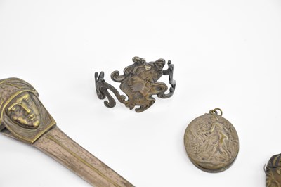 Lot 127 - ATTRIBUTED TO WMF; an Art Nouveau brass lady's...