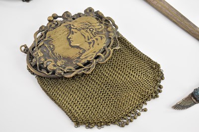 Lot 127 - ATTRIBUTED TO WMF; an Art Nouveau brass lady's...