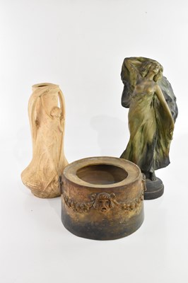 Lot 567 - ATTRIBUTED TO GOLDSCHEIDER; a circular stand...