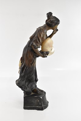 Lot 105 - An Art Nouveau painted plaster figural lamp...