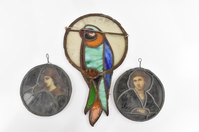 Lot 1459 - Three stained glass panels including a pair of...