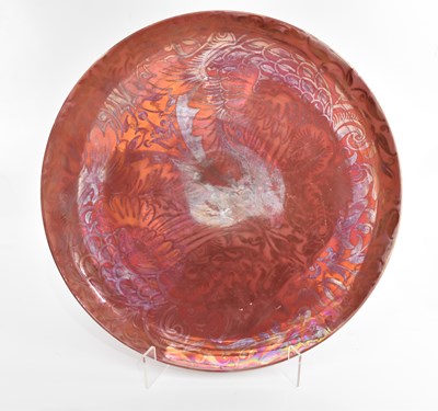 Lot 370 - An Arts & Crafts flambe wall charger, silvered...