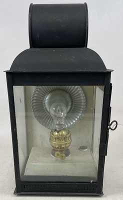 Lot 654 - A glazed lamp with converted bulb section,...