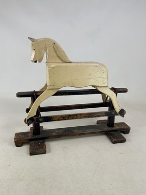 Lot 54 - A hand built painted child's wooden rocking...