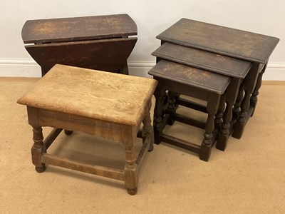 Lot 794 - A nest of oak tables, height 43cm, width 50cm,...