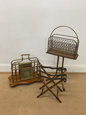 Lot 757 - Two brass and oak magazine racks and a folding...