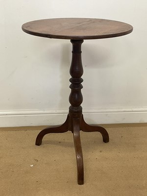 Lot 740 - A 19th century oak tripod table, height 74cm,...
