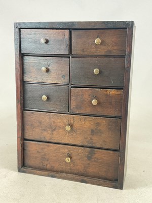Lot 741 - An oak bank of six short over two long drawers...