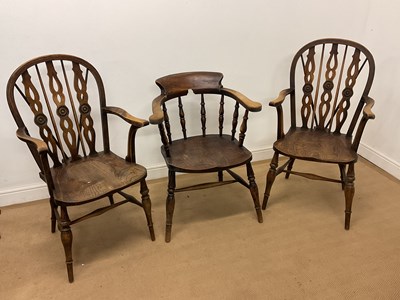 Lot 728 - A pair of circa 1900 wheel back elbow chairs...