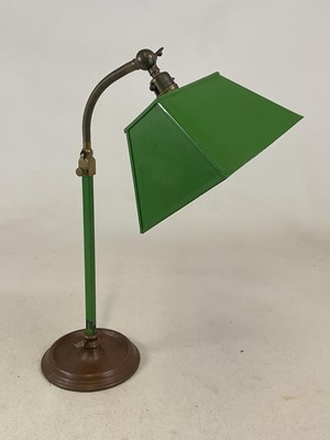 Lot 642 - An adjustable green painted desk lamp, with...