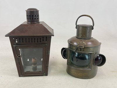 Lot 655 - A brass ship's style small lamp with three...
