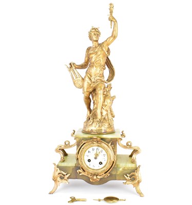 Lot 125 - An early 20th century French onyx clock with...