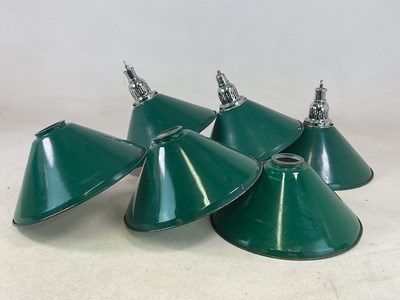 Lot 624 - A set of six green enamelled industrial...