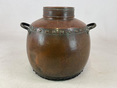 Lot 178 - A large copper twin handled vessel, with both...