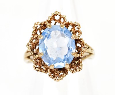 Lot 1343 - A 9ct yellow gold ring set with an oval pale...