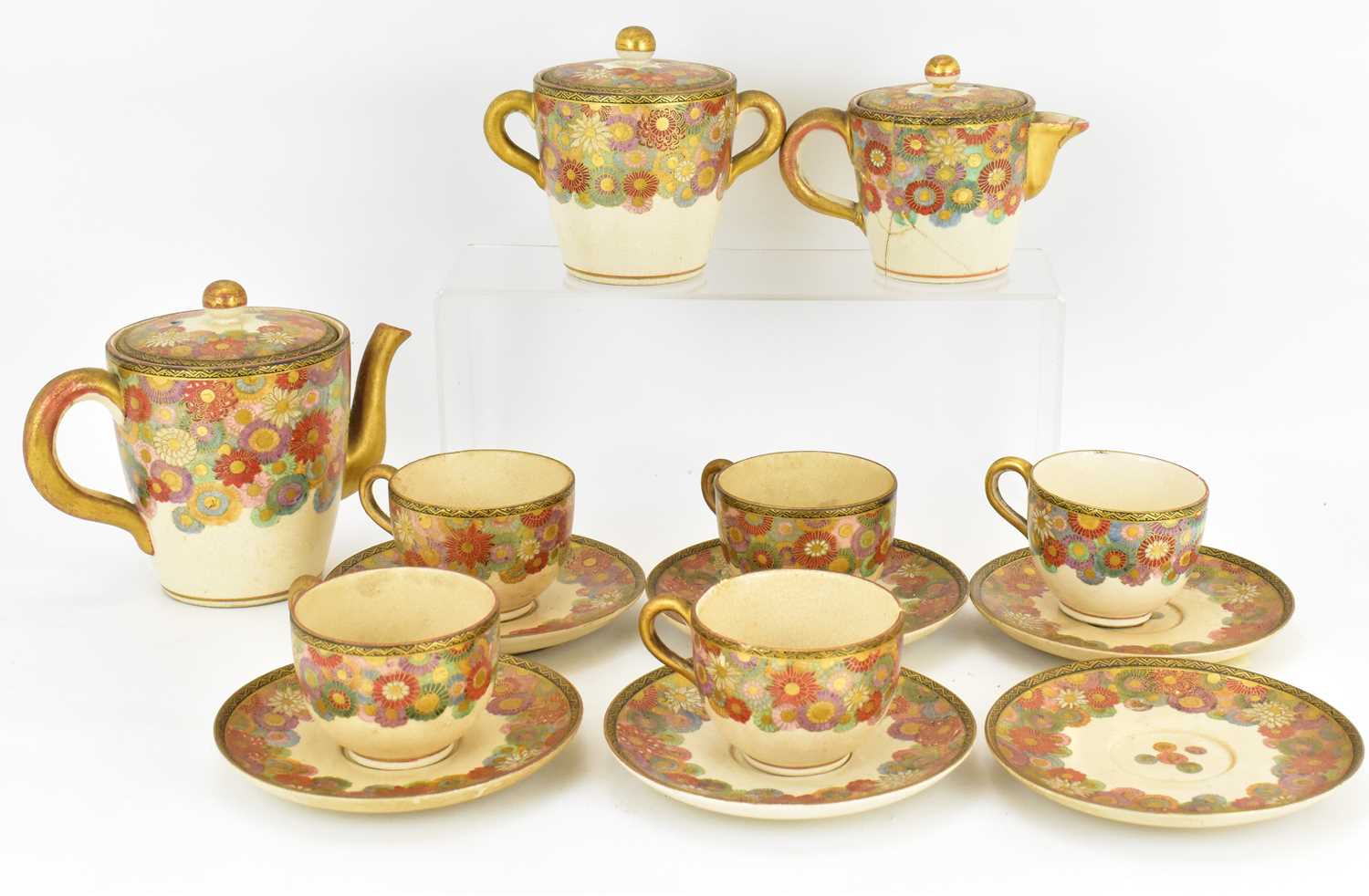 Lot 487 - A fourteen-piece Japanese Satsuma tea service,...