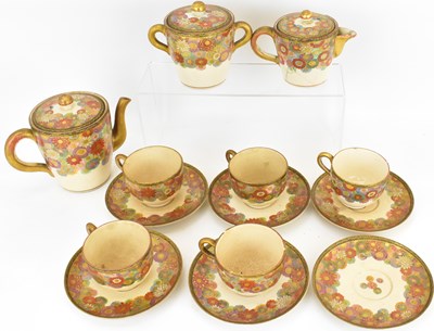 Lot 487 - A fourteen-piece Japanese Satsuma tea service,...