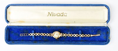 Lot 1597 - NIVADA; a 9ct yellow gold ladies' wristwatch,...