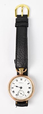 Lot 1599 - WALTHAM; a gold-plated fob watch converted to...