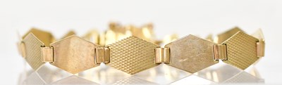Lot 1417 - A 9ct yellow gold bracelet with hexagonal...