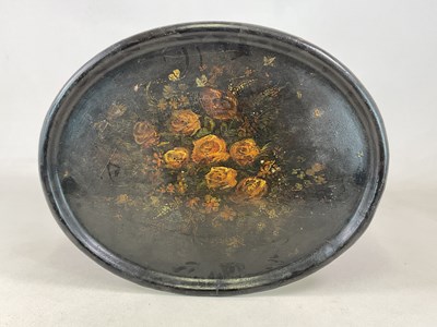 Lot 58 - A lacquered papier mache oval tray, with...