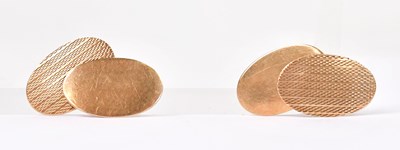 Lot 1388 - A pair of 9ct yellow gold oval cufflinks with...