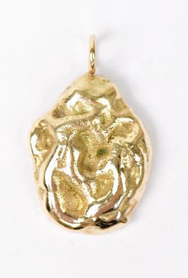 Lot 1437 - A yellow metal nugget pendant, length...