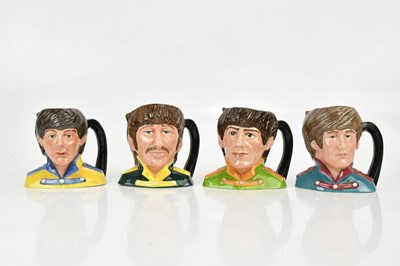 Lot 1570 - ROYAL DOULTON; a set of four 'The Beatles'...