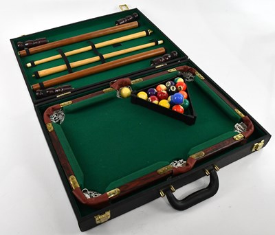 Lot 1393 - A cased modern portable American pool set.