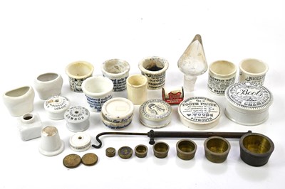 Lot 1462 - A collection of assorted advertising pot lids,...
