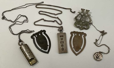 Lot 534 - A silver ingot pendant on chain, a hallmarked...