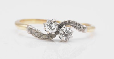 Lot 471 - An 18ct yellow gold diamond crossover ring,...